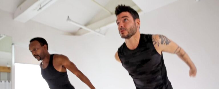 Happy couple performs burpees